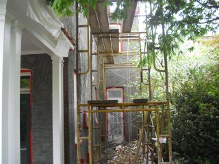 Scratch coat on old brick