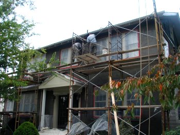 stuccoed house
                over old "Salmon brick".