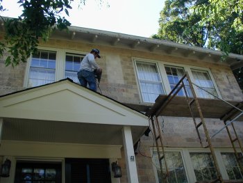 Paint is chipped off of brick