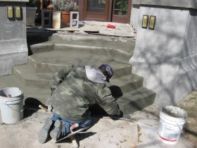 Loose and spalling areas are chipped off