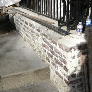 Stucco toren off brick