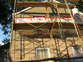 stucco gables are loose and are torn off and redone