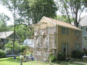 We stuccoed the chimney on the house behind