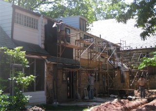 Siding off, traditional stucco on