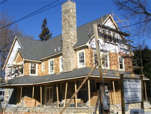 Pebble dash stucco on new house