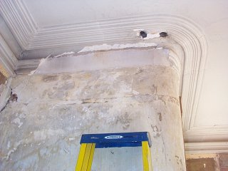 Damaged plaster moldings