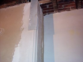 Next, a
              wood strip is nailed to the arris