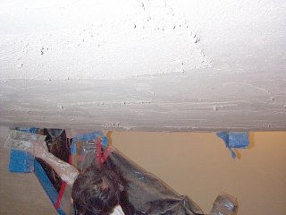Ceiling is filled flush to the stairway