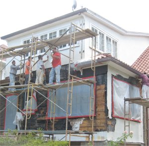 Tearing off the old stucco