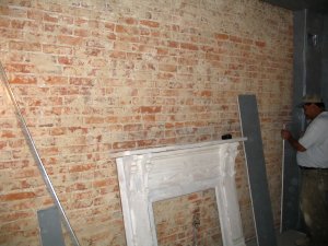 Plaster was stripped off of bricks