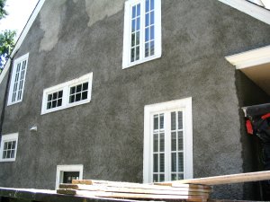 old lime and sand stucco is replaced