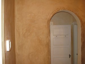 Color in dining room has a leather-like appearance