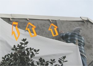 Coping
              (flashing on a parapet wall) is wedged