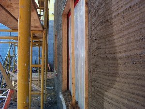 Wood strips are set on the
window returns