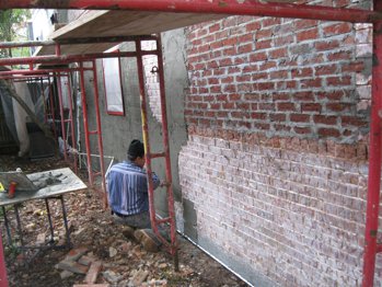 scratch coat on bricks